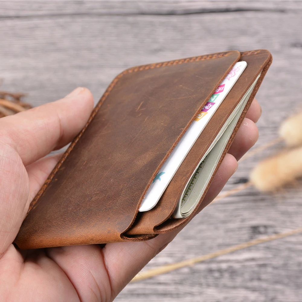 Винтажный кожаный бумажник с держателем для наличных денег, зажим для денег, дорожный кошелек из воловьей кожи для мужчин и женщин
Винтажный кожаный бумажник с держателем для наличных денег, зажим для денег, дорожный кошелек из воловьей кожи для мужчин и женщин