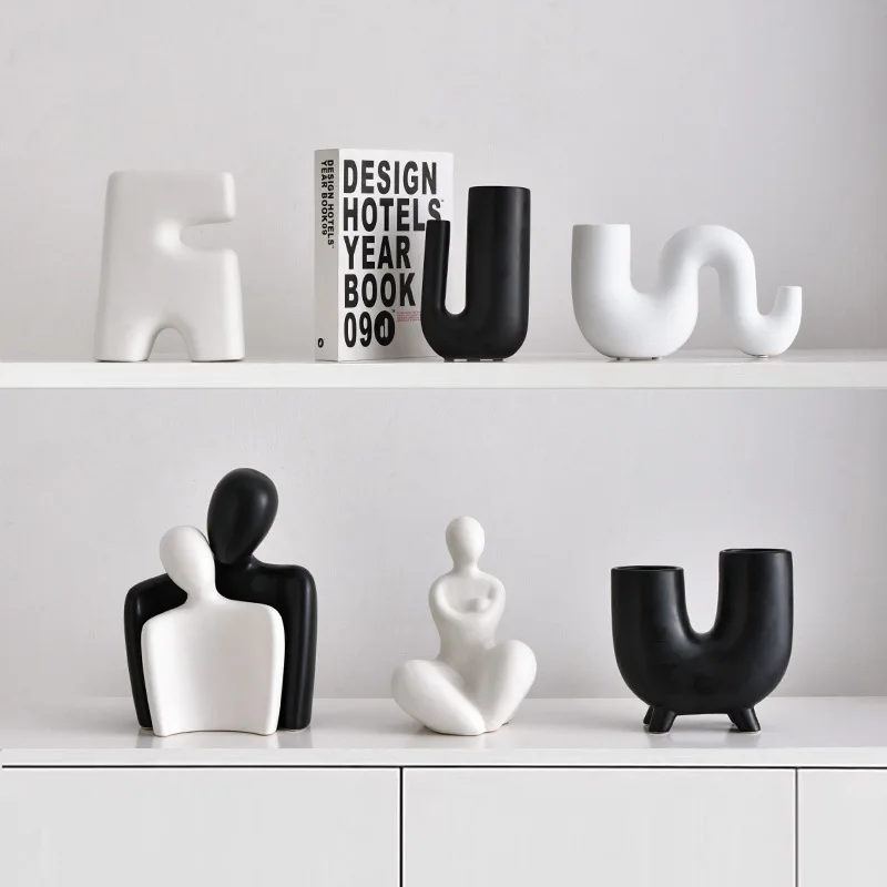 Modern abstract art shaped vase decoration home living room wine cabinet decoration niche model decoration wholesale
Modern abstract art shaped vase decoration home living room wine cabinet decoration niche model decoration wholesale