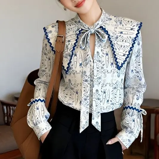 Korean light luxury atmosphere printed neckline lace-up long-sleeved women's spring 2026 new age-reducing super-good-looking top
Korean light luxury atmosphere printed neckline lace-up long-sleeved women's spring 2026 new age-reducing super-good-looking top