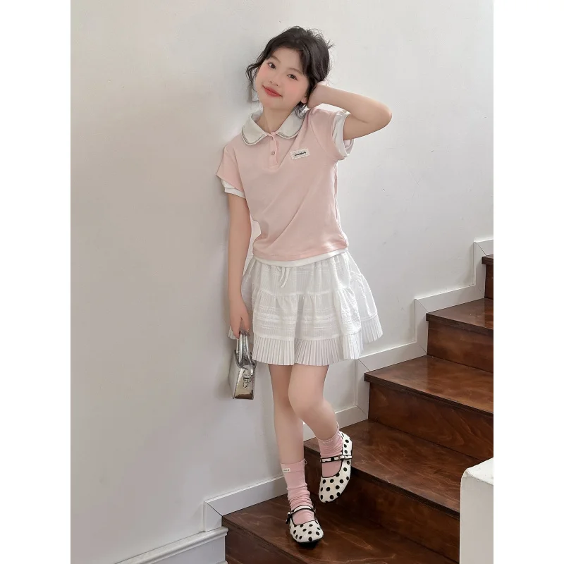 Girls PinkpoloSummer new college-style shirt set, short-sleeved top and white cake skirt two-piece set, trendy
Girls PinkpoloSummer new college-style shirt set, short-sleeved top and white cake skirt two-piece set, trendy