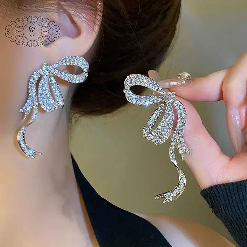 Dazzling Brilliance Bow-Knot Stud Earrings, Exquisite Alloy & Rhinestone Design for a Delicate Sparkle
Dazzling Brilliance Bow-Knot Stud Earrings, Exquisite Alloy & Rhinestone Design for a Delicate Sparkle