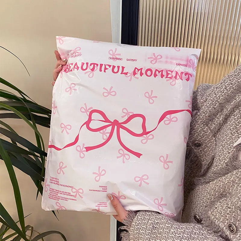 10Pc INS Beautiful Pink Bow Express Bag Women Kids Clothes Outfit Shop Packing Bag Online Store Delivery Waterproof Shipping Bag
10Pc INS Beautiful Pink Bow Express Bag Women Kids Clothes Outfit Shop Packing Bag Online Store Delivery Waterproof Shipping Bag