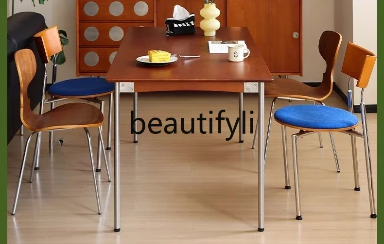 A15 Solid wood dining table retro household small apartment Nordic medieval rectangular log dining table and chairs
A15 Solid wood dining table retro household small apartment Nordic medieval rectangular log dining table and chairs