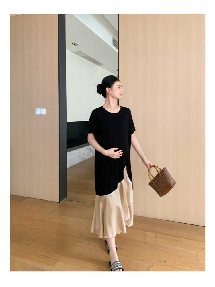 A new fashionable short-sleeved dress for pregnant women with satin stitching
A new fashionable short-sleeved dress for pregnant women with satin stitching