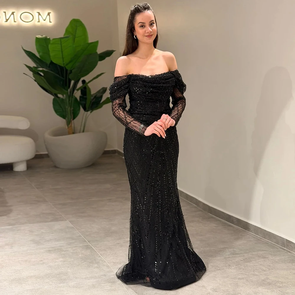 Vanessa Customized Black Tulle Sequined Mermaid Evening Dress Luxury Beading Off the Shoulder Long Sleeves Formal Party Gowns
Vanessa Customized Black Tulle Sequined Mermaid Evening Dress Luxury Beading Off the Shoulder Long Sleeves Formal Party Gowns