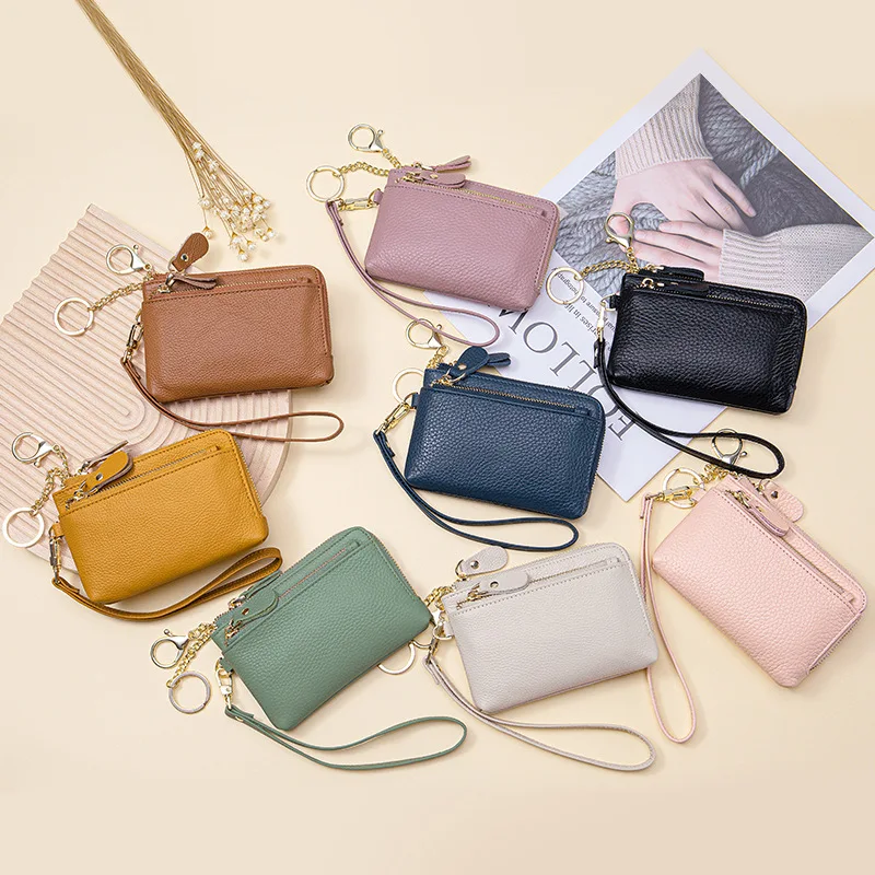 Genuine Leather Women Coin Zipper Pocket Mini RFID Blocking Wallet with cash Card Slots Zipper Around Wristlet Keychain 
Genuine Leather Women Coin Zipper Pocket Mini RFID Blocking Wallet with cash Card Slots Zipper Around Wristlet Keychain