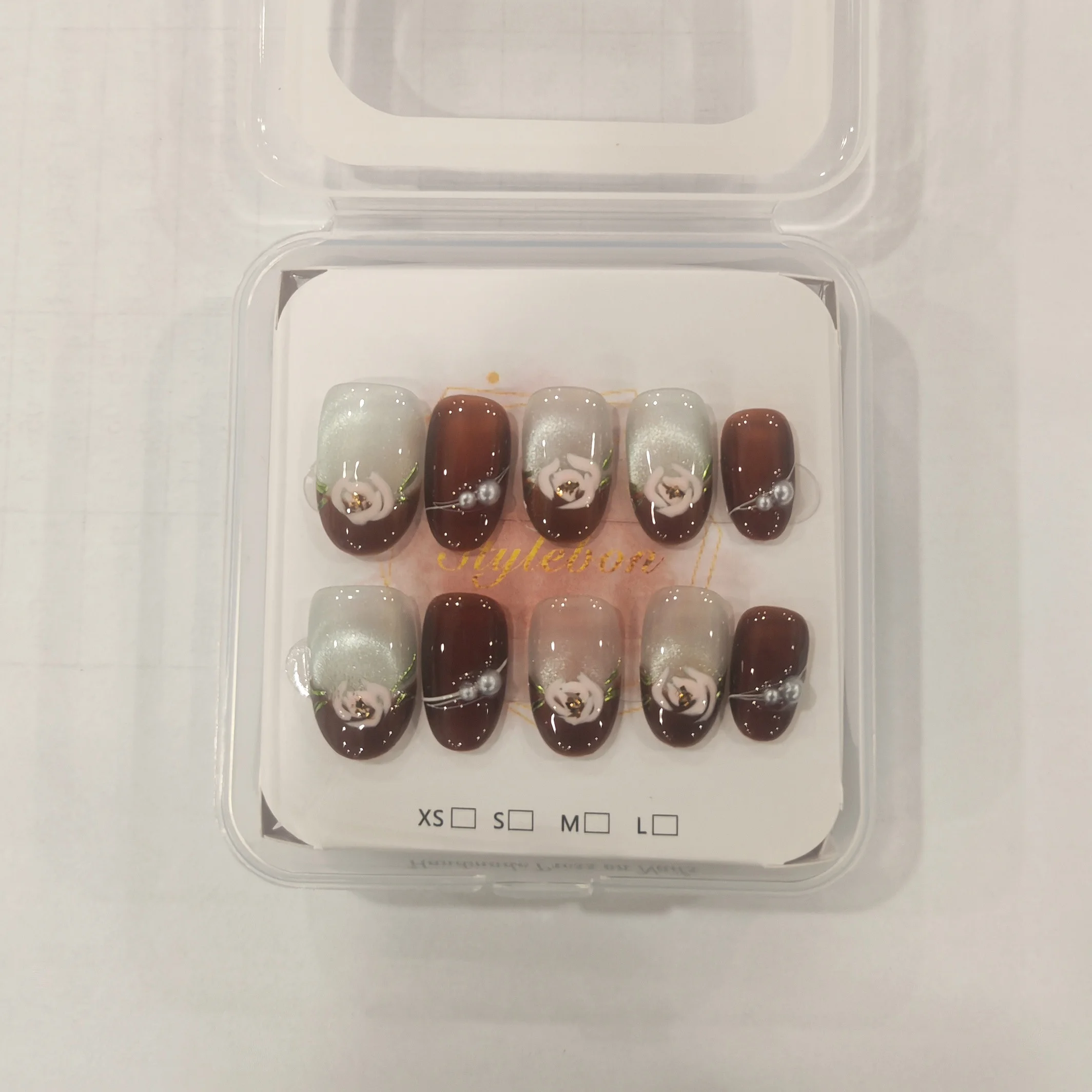 10Pcs Handmade Press On Nails Short Almond Cat Eye Brown French Tip Fake Nails With 3D White Camellia Pearl Acrylic False Nail
10Pcs Handmade Press On Nails Short Almond Cat Eye Brown French Tip Fake Nails With 3D White Camellia Pearl Acrylic False Nail