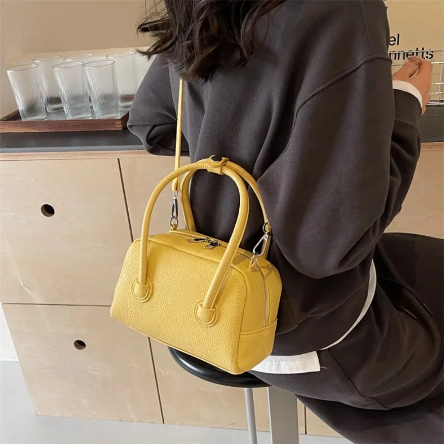 Tote bowling bag women's spring and summer models popular senior sense of shoulder foreign simple hundred crossbody bag
Tote bowling bag women's spring and summer models popular senior sense of shoulder foreign simple hundred crossbody bag