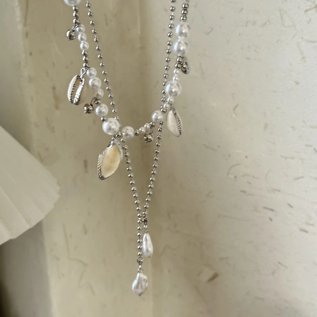 DUTRIEUX Bohemia Style Double Layered Conch Imitation Pearl Pendant Necklace Stylish Beach Vacation Choker Jewelry Party Gifts
DUTRIEUX Bohemia Style Double Layered Conch Imitation Pearl Pendant Necklace Stylish Beach Vacation Choker Jewelry Party Gifts