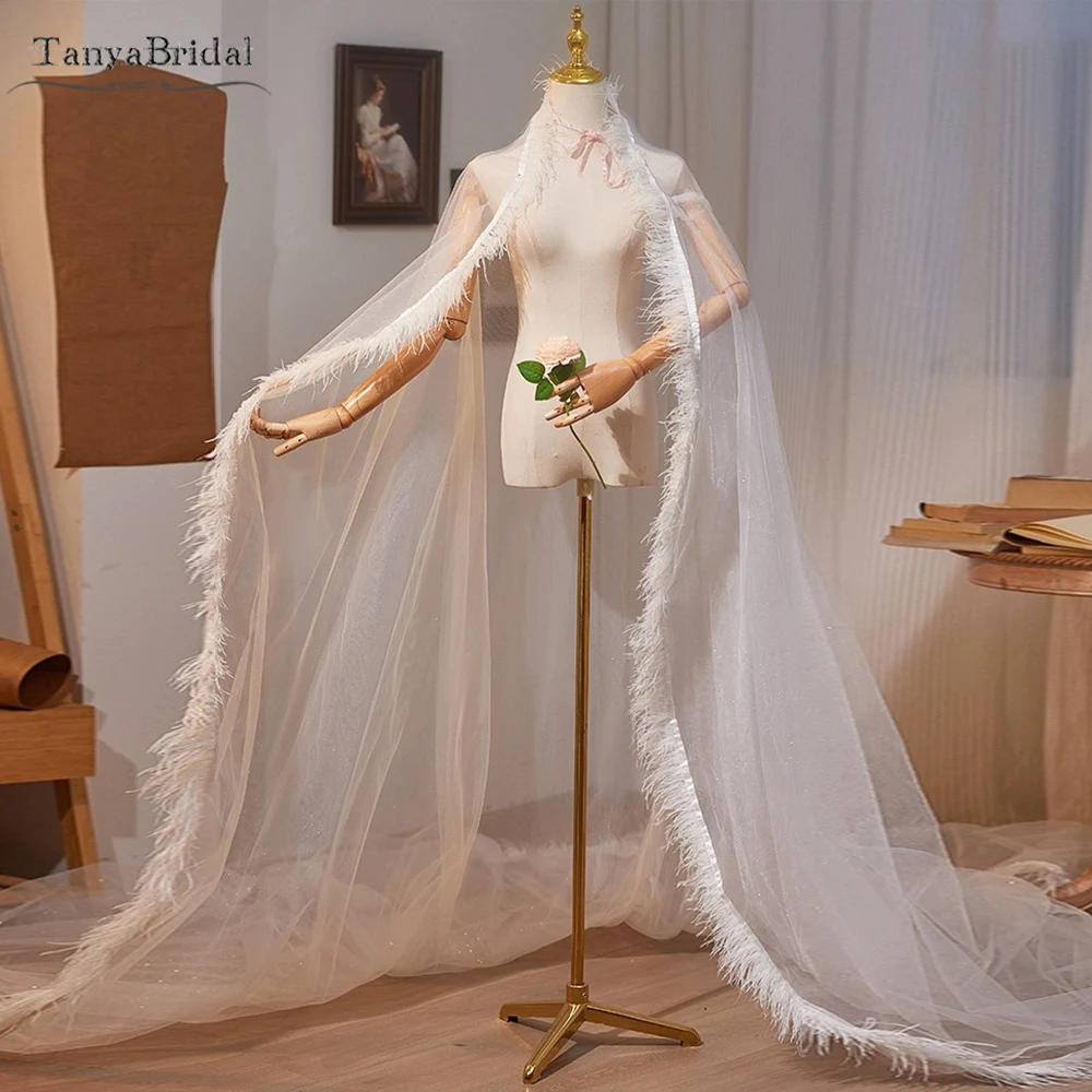 Sheer Tulle Wedding Cape With Feather Edge ,Romantic Bridal Jacket ,Wedding Veils DJ410
Sheer Tulle Wedding Cape With Feather Edge ,Romantic Bridal Jacket ,Wedding Veils DJ410