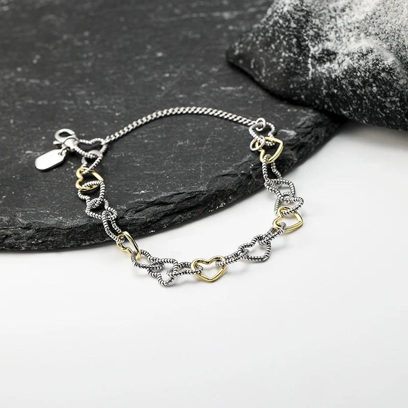 SL008 genuine 925 sterling silver twisted wire connected heart-shaped pendant bracelet
SL008 genuine 925 sterling silver twisted wire connected heart-shaped pendant bracelet