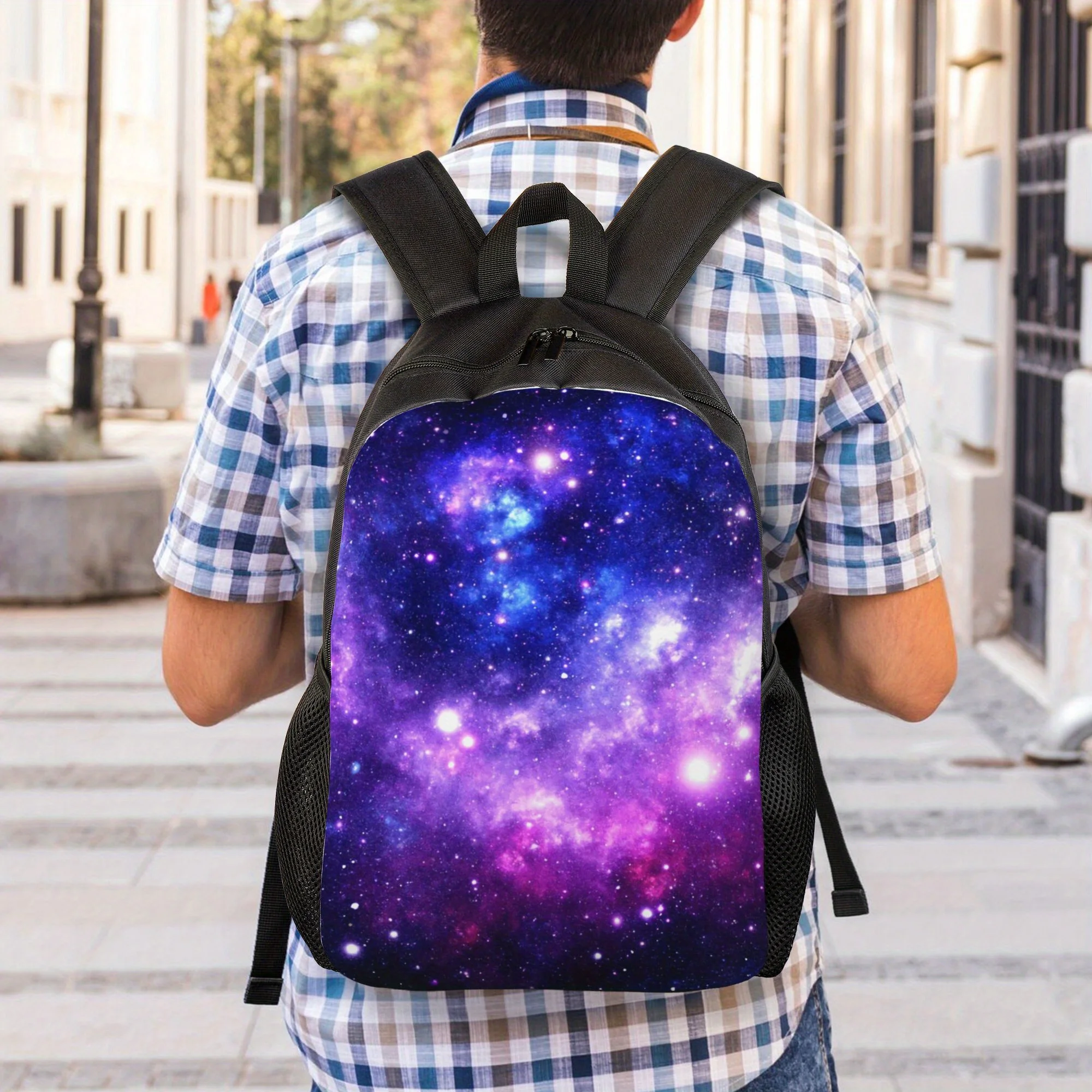 A casual backpack featuring a purple-blue galaxy nebula design with a single compartment, perfect for daily use or weekend
A casual backpack featuring a purple-blue galaxy nebula design with a single compartment, perfect for daily use or weekend