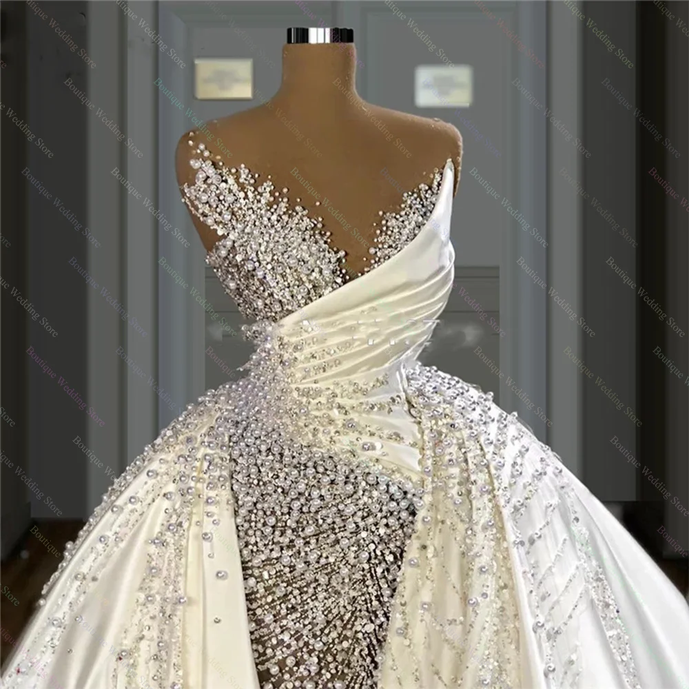 Major Pearls Wedding Dresses Fashion Strapless Beads Sequined Mermaid Gowns Elegant Sleeveless Removable Train Bride Dresses 
Major Pearls Wedding Dresses Fashion Strapless Beads Sequined Mermaid Gowns Elegant Sleeveless Removable Train Bride Dresses