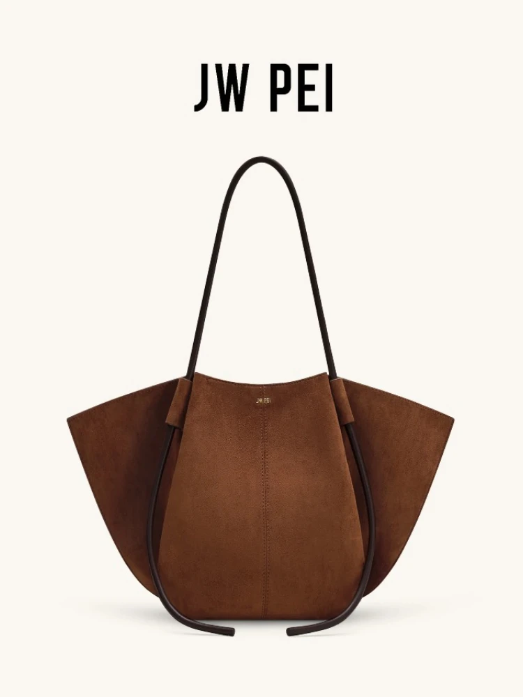 JW PEI Women's Tote Bag in Faux Suede, Spacious Wing Design for Everyday Use, with Versatile Shoulder and Handheld Options
JW PEI Women's Tote Bag in Faux Suede, Spacious Wing Design for Everyday Use, with Versatile Shoulder and Handheld Options
