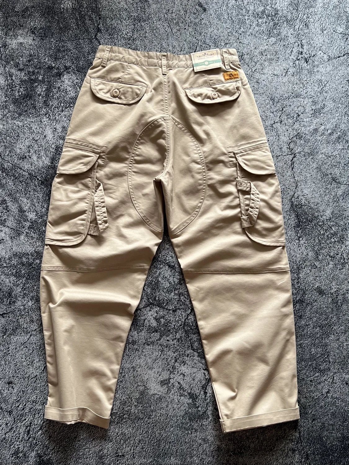 Весенне-осенние мужские свободные прямые эластичные рабочие брюки с несколькими карманами, повседневные лоскутные японские модные мужские брюки
Весенне-осенние мужские свободные прямые эластичные рабочие брюки с несколькими карманами, повседневные лоскутные японские модные мужские брюки