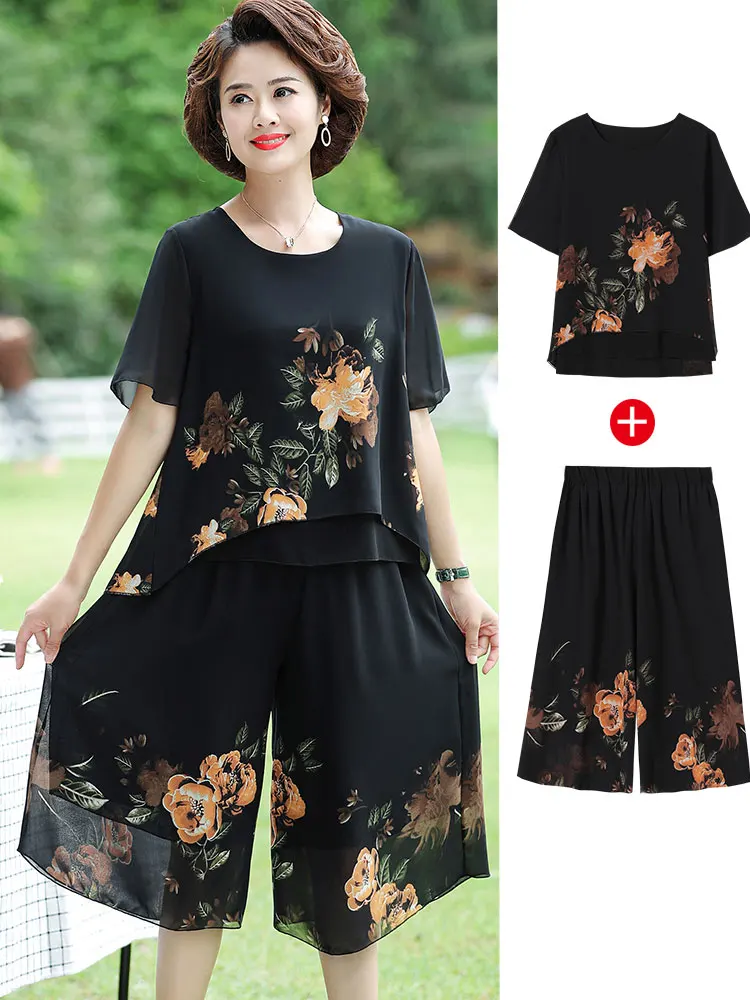 Summer New Casual Print Short Suit Women Fashion Round Neck Short Sleeve Irregular Top Elastic Waist Pants Two Piece Set Wh22
Summer New Casual Print Short Suit Women Fashion Round Neck Short Sleeve Irregular Top Elastic Waist Pants Two Piece Set Wh22