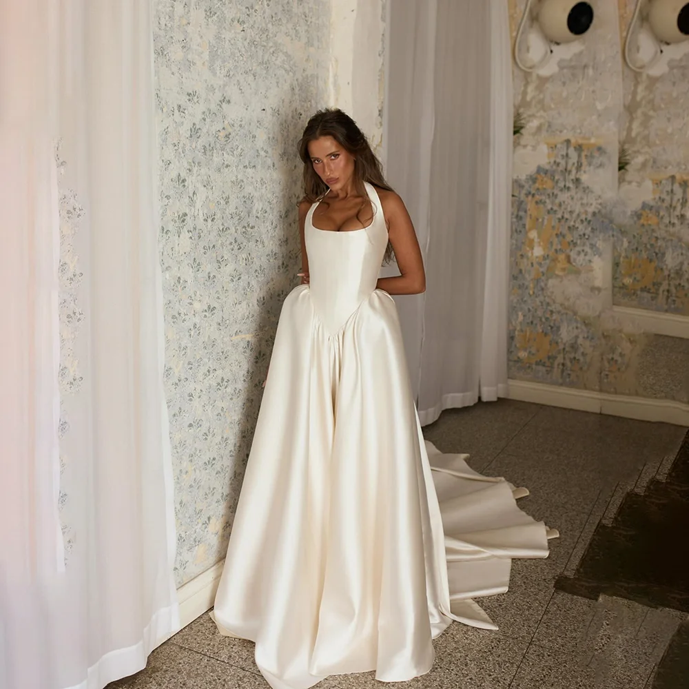 Women's Elegant Ivory Satin Halter Neck Wedding Dress Corset Bodice Ball Gown with Train for Bridal Wedding Evening Party Events
Women's Elegant Ivory Satin Halter Neck Wedding Dress Corset Bodice Ball Gown with Train for Bridal Wedding Evening Party Events