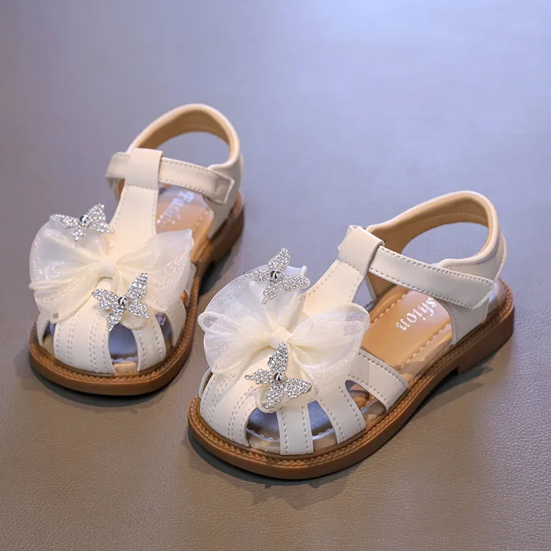 Girls' Sandals 2025 New Summer Fashion Bow Girls' Crystal Princess Shoes Children's Soft Bottom Closed-toe Casual Beach Shoes
Girls' Sandals 2025 New Summer Fashion Bow Girls' Crystal Princess Shoes Children's Soft Bottom Closed-toe Casual Beach Shoes