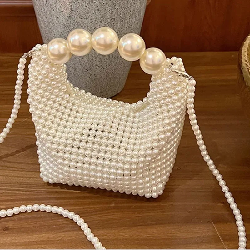 Fashion handmade woven women bag large pearl women handbag shoulder bag high-quality party bag
Fashion handmade woven women bag large pearl women handbag shoulder bag high-quality party bag