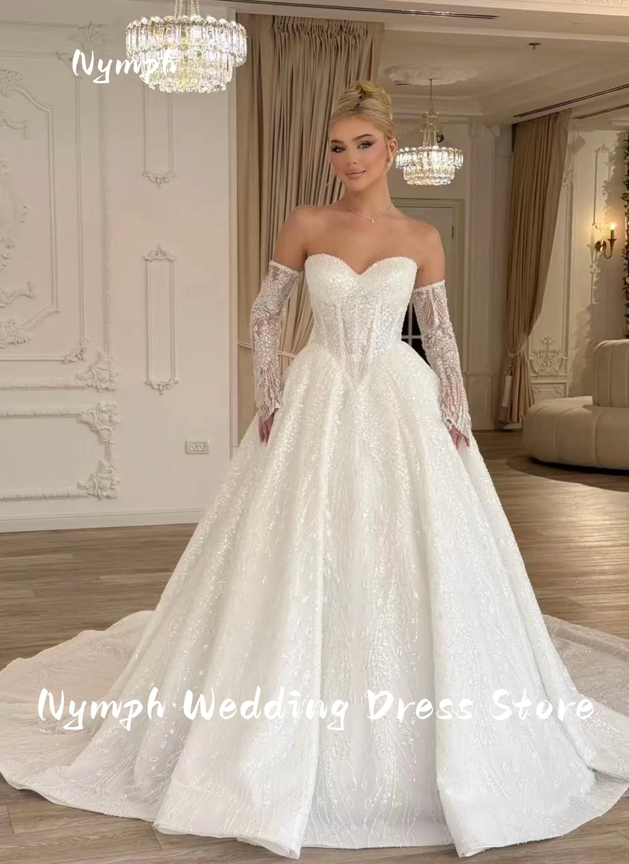 Exquisite Sweetheart A-Line Wedding Dress 2026 Shiny Beaded Long Sleeve Princess Bride Gown customized Vestido de Noiva
Exquisite Sweetheart A-Line Wedding Dress 2026 Shiny Beaded Long Sleeve Princess Bride Gown customized Vestido de Noiva