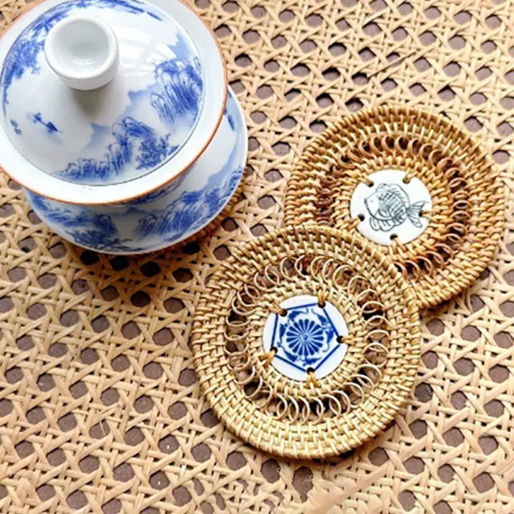 Creative Rattan Weaving Vietnamese Rattan Ceramic Coaster Handmade Heat Insulation Drink Cup Mat Non-Slip Retro Teapot Mat Craft 
Creative Rattan Weaving Vietnamese Rattan Ceramic Coaster Handmade Heat Insulation Drink Cup Mat Non-Slip Retro Teapot Mat Craft