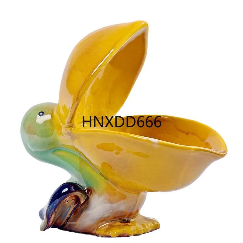 Ceramic Handicrafts Pelican Desktop Storage Tray Fruit Plate Bird Storage Container Simulated Animal Sculptures Home Decoration
Ceramic Handicrafts Pelican Desktop Storage Tray Fruit Plate Bird Storage Container Simulated Animal Sculptures Home Decoration