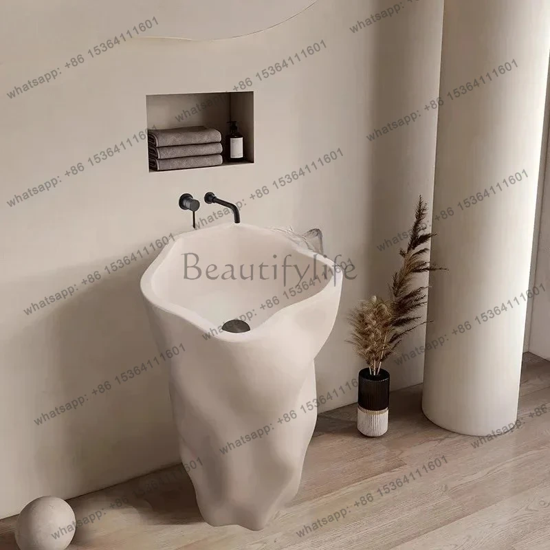 Japanese cream style designer column basin floor-to-ceiling integrated art wash basin creative personalized face wash table
Japanese cream style designer column basin floor-to-ceiling integrated art wash basin creative personalized face wash table