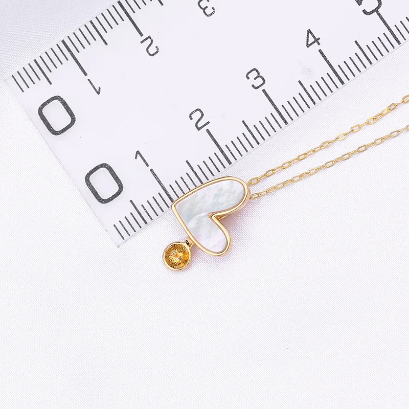 1 Pair D414 14K Gold Plated Heart Pearl Pendant Tray DIY Jewelry Accessories Color Retention Chain And Pearl Not Included
1 Pair D414 14K Gold Plated Heart Pearl Pendant Tray DIY Jewelry Accessories Color Retention Chain And Pearl Not Included