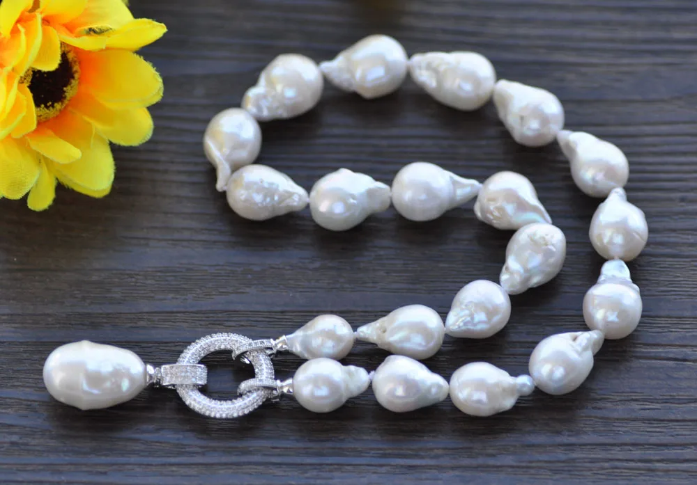 MCT·STAR 20“ 20mm White Drop Baroque Keshi Pearl Choker Necklace Pendant CZ (P7558 )
MCT·STAR 20“ 20mm White Drop Baroque Keshi Pearl Choker Necklace Pendant CZ (P7558 )