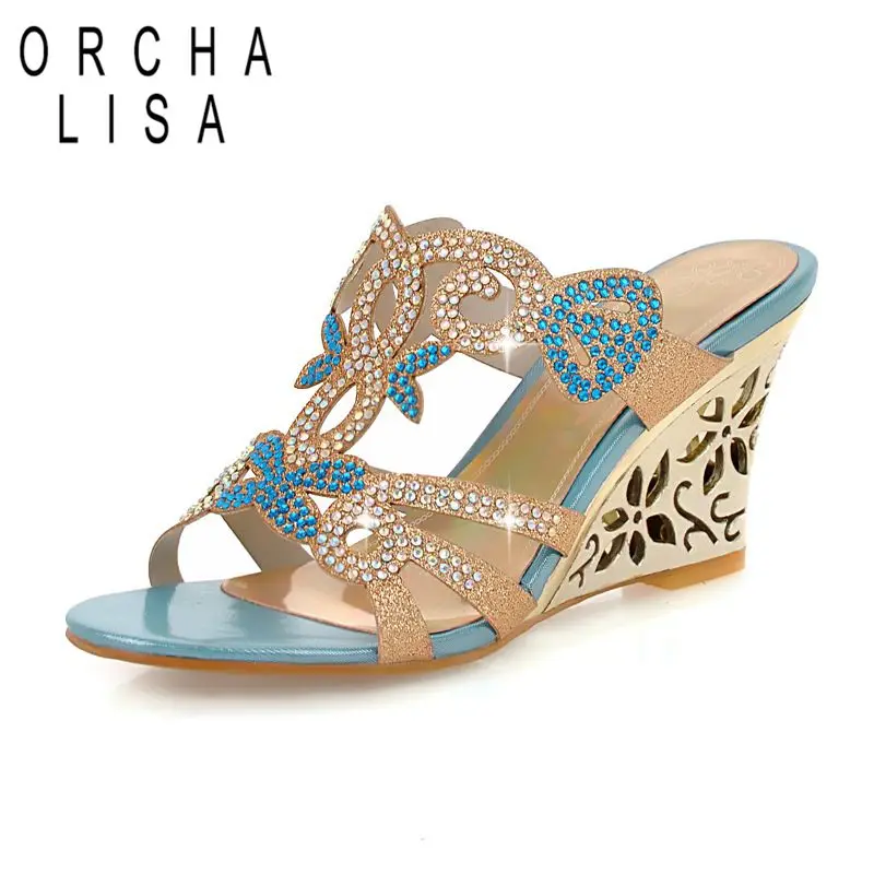 ORCHA LISA 2025 Новый дизайн Женские сандалии с открытым носком на танкетке 8 см без шнуровки Мюли с блестящими кристаллами смешанного цвета Большой размер 42 43 Повседневная обувь
ORCHA LISA 2025 Новый дизайн Женские сандалии с открытым носком на танкетке 8 см без шнуровки Мюли с блестящими кристаллами смешанного цвета Большой размер 42 43 Повседневная обувь