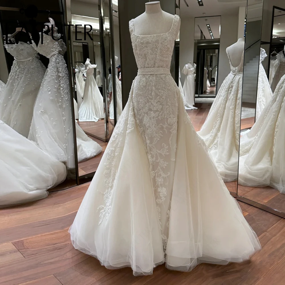 2 in 1 Ivory Tulle Bridal Wedding Dresses Shoulder Straps Square neck Lace Appliques Bride Gown New Design 2024 Detachable Train
2 in 1 Ivory Tulle Bridal Wedding Dresses Shoulder Straps Square neck Lace Appliques Bride Gown New Design 2024 Detachable Train