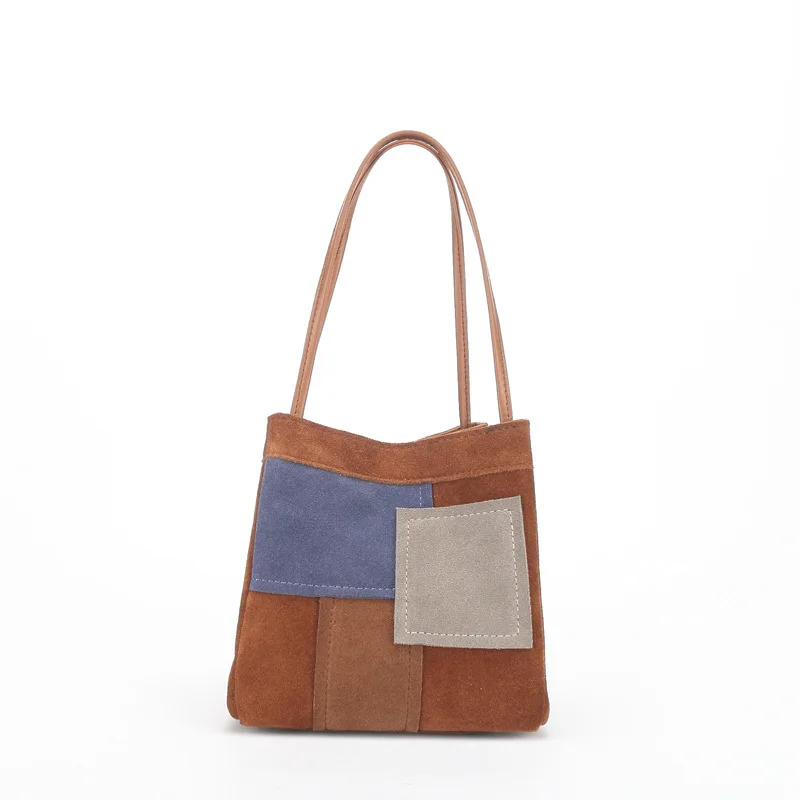 Frosted first-layer cowhide bucket bag, high-end niche handbag, women's bag, new model.
Frosted first-layer cowhide bucket bag, high-end niche handbag, women's bag, new model.