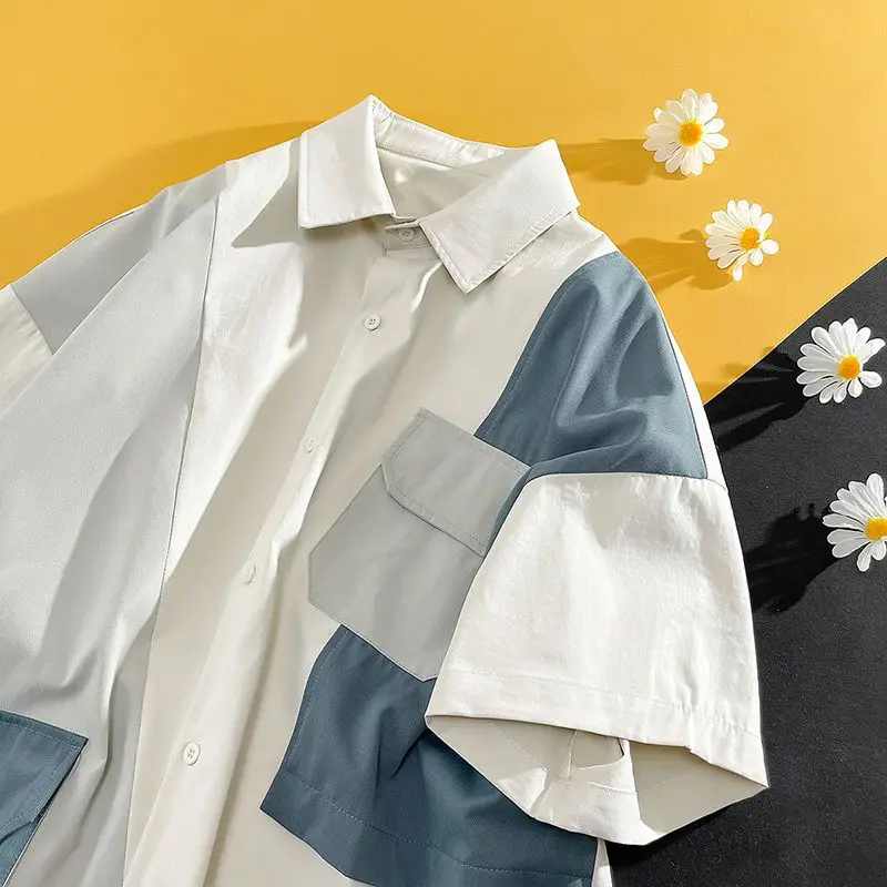 2024 new short sleeved shirt summer high-end design niche workwear patchwork top casual handsome jacket Hong Kong style shirt
2024 new short sleeved shirt summer high-end design niche workwear patchwork top casual handsome jacket Hong Kong style shirt