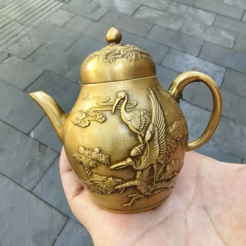 Chinese collection antique brass relief cranes wine pots teapots Chinese style home tea ceremony crafts ornaments
Chinese collection antique brass relief cranes wine pots teapots Chinese style home tea ceremony crafts ornaments