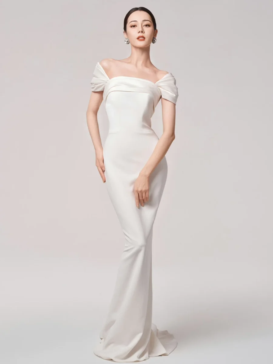 Simplified White Satin One-Shoulder Wedding Dress for Bridal Return Visit Dinner Party Tailored Evening Gown with Short Sleeves
Simplified White Satin One-Shoulder Wedding Dress for Bridal Return Visit Dinner Party Tailored Evening Gown with Short Sleeves