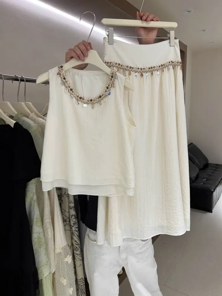 2025 Spring/Summer Korean Style Beaded Trim Co-ord Set Round Neck Sleeveless Top + High Waist Skirt Elegant Two-Piece Outfit
2025 Spring/Summer Korean Style Beaded Trim Co-ord Set Round Neck Sleeveless Top + High Waist Skirt Elegant Two-Piece Outfit