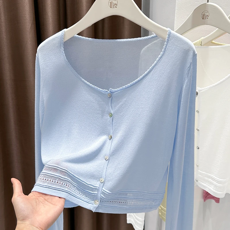 Lightweight and breathable blue knitted cardigan to wear with a high-end skirt and shawl, long summer seaside sun protection blo
Lightweight and breathable blue knitted cardigan to wear with a high-end skirt and shawl, long summer seaside sun protection blo