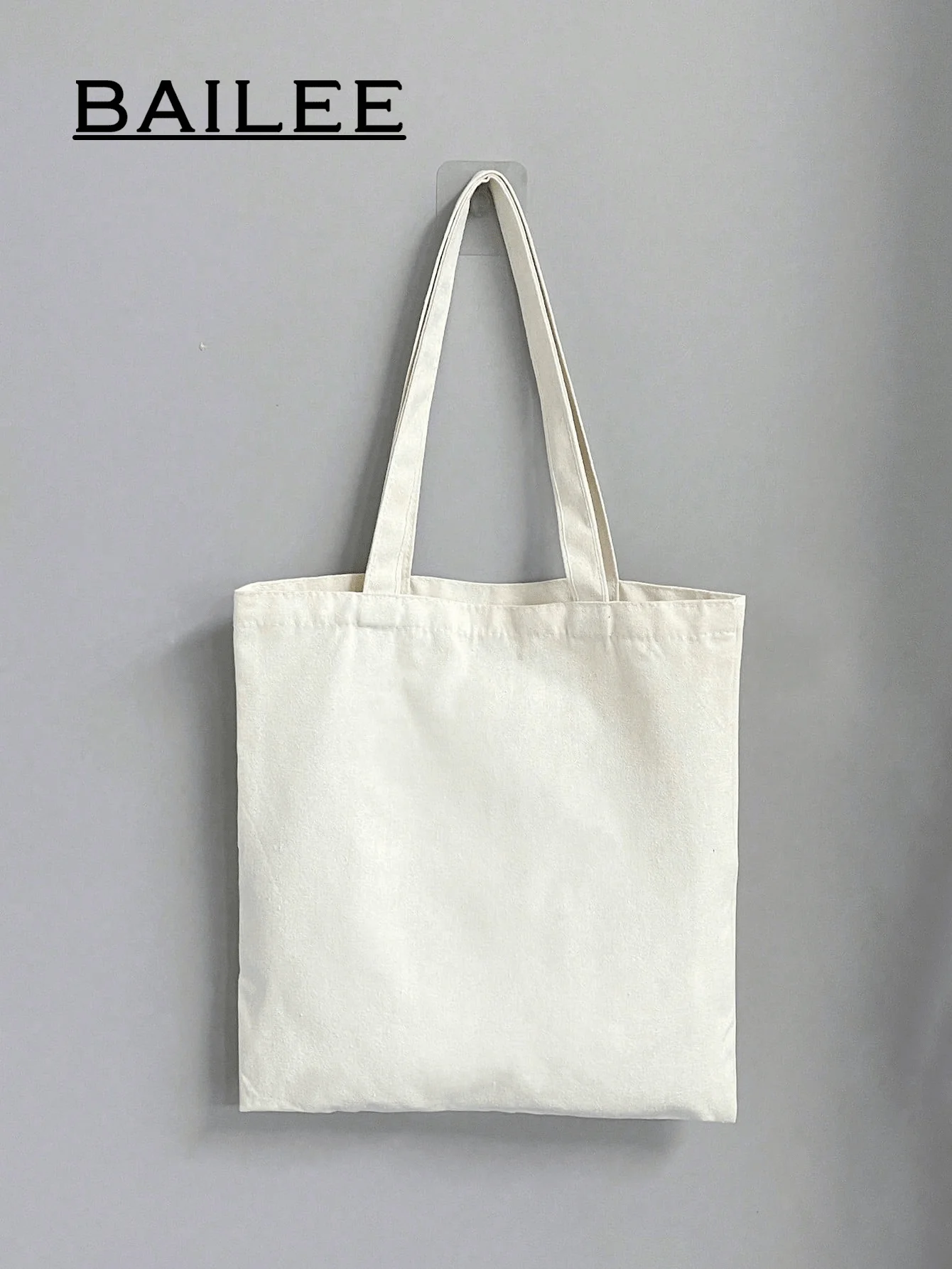 Белая холщовая сумка-тоут с длинными ручками, повседневный минималистичный дизайн для ежедневного использования
Белая холщовая сумка-тоут с длинными ручками, повседневный минималистичный дизайн для ежедневного использования