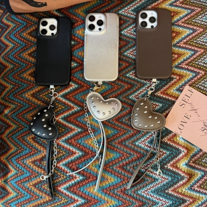 Heart-shaped Rivet Lanyard Phone Case Compatible with Apple16/15PROPure color protective coveriPhone14PROPersonality
Heart-shaped Rivet Lanyard Phone Case Compatible with Apple16/15PROPure color protective coveriPhone14PROPersonality