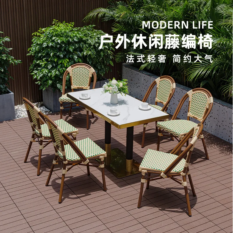 Outdoor table and chair combination courtyard garden leisure rattan chair tea table and chair western restaurant milk tea shop w
Outdoor table and chair combination courtyard garden leisure rattan chair tea table and chair western restaurant milk tea shop w
