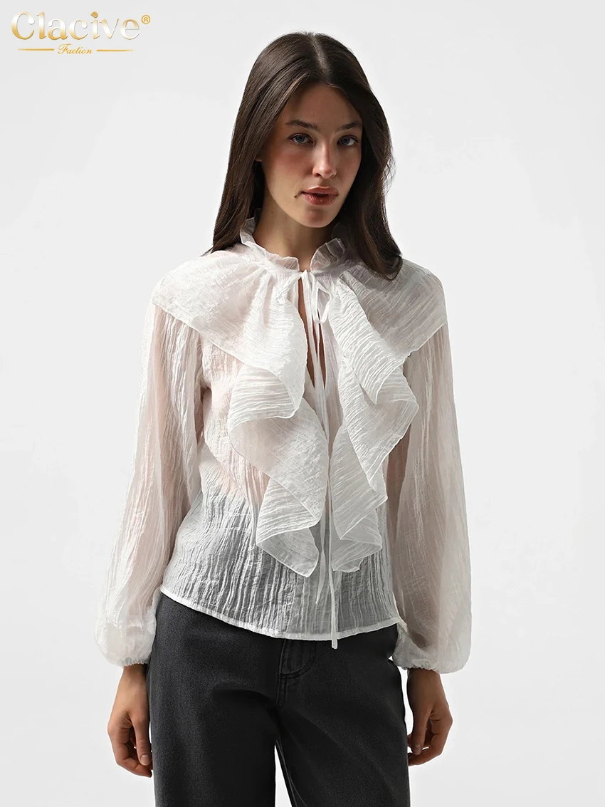 Clacive, сексуальная свободная белая женская рубашка 2026, повседневные рубашки с воротником-стойкой и длинными рукавами, элегантный классический топ с оборками, женская одежда
Clacive, сексуальная свободная белая женская рубашка 2026, повседневные рубашки с воротником-стойкой и длинными рукавами, элегантный классический топ с оборками, женская одежда
