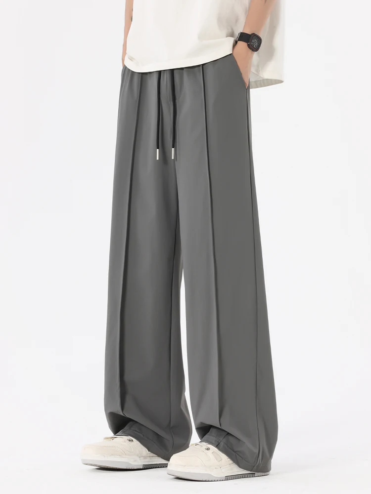 Summer Ice Silk Thin Straight Casual Pants Men Loose Drape Sports Qui Dry Versatile Trendy Wide Leg Long Pants
Summer Ice Silk Thin Straight Casual Pants Men Loose Drape Sports Qui Dry Versatile Trendy Wide Leg Long Pants