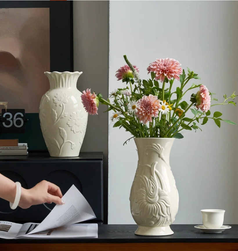 Light luxury relief cream style ceramic vase for home decoration, living room water care, flower arrangement, dining table decor
Light luxury relief cream style ceramic vase for home decoration, living room water care, flower arrangement, dining table decor