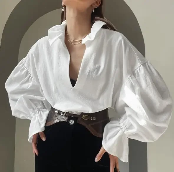 2026 Spring Women's Cotton White Shirt with Loose Texture V-Neck Bubble Sleeve Fashion Top Temperament Commuting Women Blouses
2026 Spring Women's Cotton White Shirt with Loose Texture V-Neck Bubble Sleeve Fashion Top Temperament Commuting Women Blouses