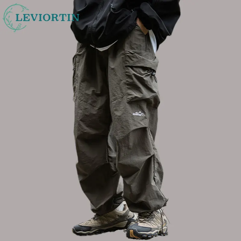 Men's Functional Overalls Trousers Fashion Personality Versatile Hip Hop Wide Pine Nut Elastic Bag Waterproof Casual Pants
Men's Functional Overalls Trousers Fashion Personality Versatile Hip Hop Wide Pine Nut Elastic Bag Waterproof Casual Pants