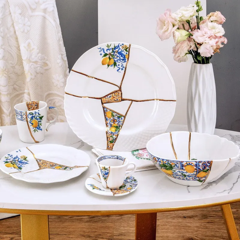 Итальянский легкий роскошный лоскутный дизайн Kintsugi Lemon Series Керамические тарелки и миски Посуда из настоящего золота Керамика Bo с ручной росписью
Итальянский легкий роскошный лоскутный дизайн Kintsugi Lemon Series Керамические тарелки и миски Посуда из настоящего золота Керамика Bo с ручной росписью