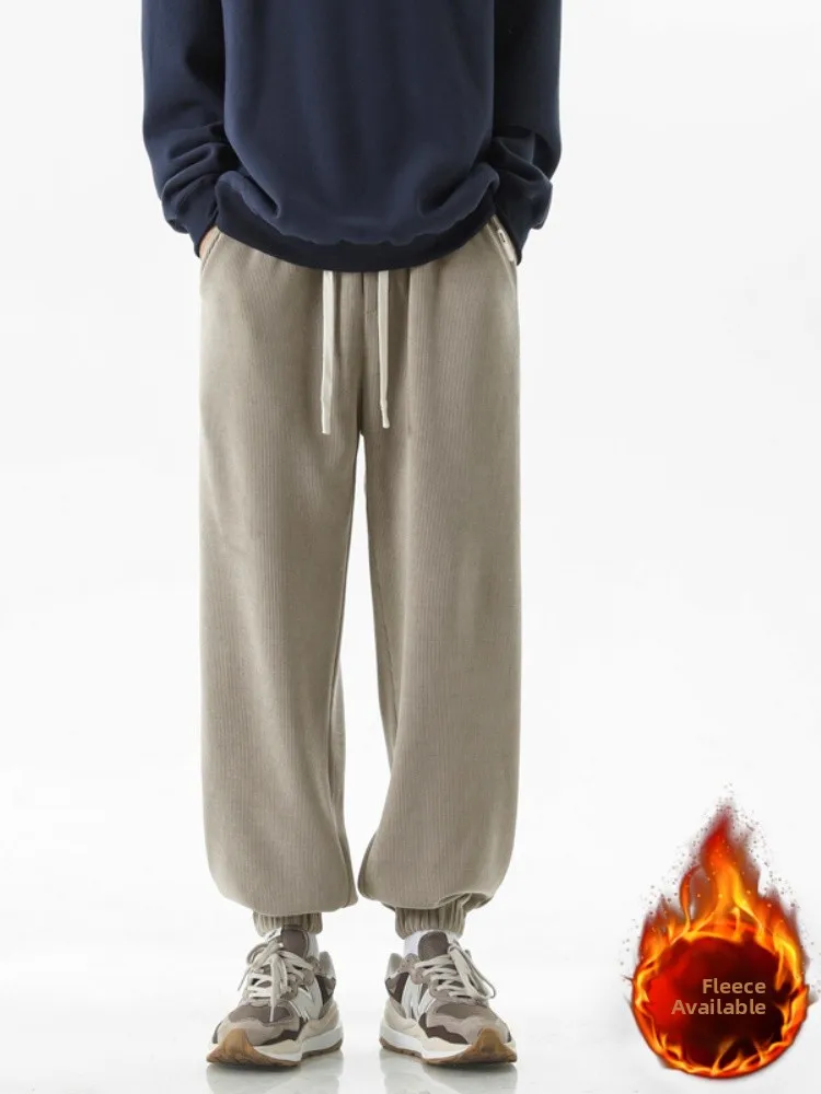 Мужские зимние утепленные вельветовые спортивные брюки свободного кроя с эластичным поясом и застежкой на шнурке, длинные повседневные брюки
Мужские зимние утепленные вельветовые спортивные брюки свободного кроя с эластичным поясом и застежкой на шнурке, длинные повседневные брюки