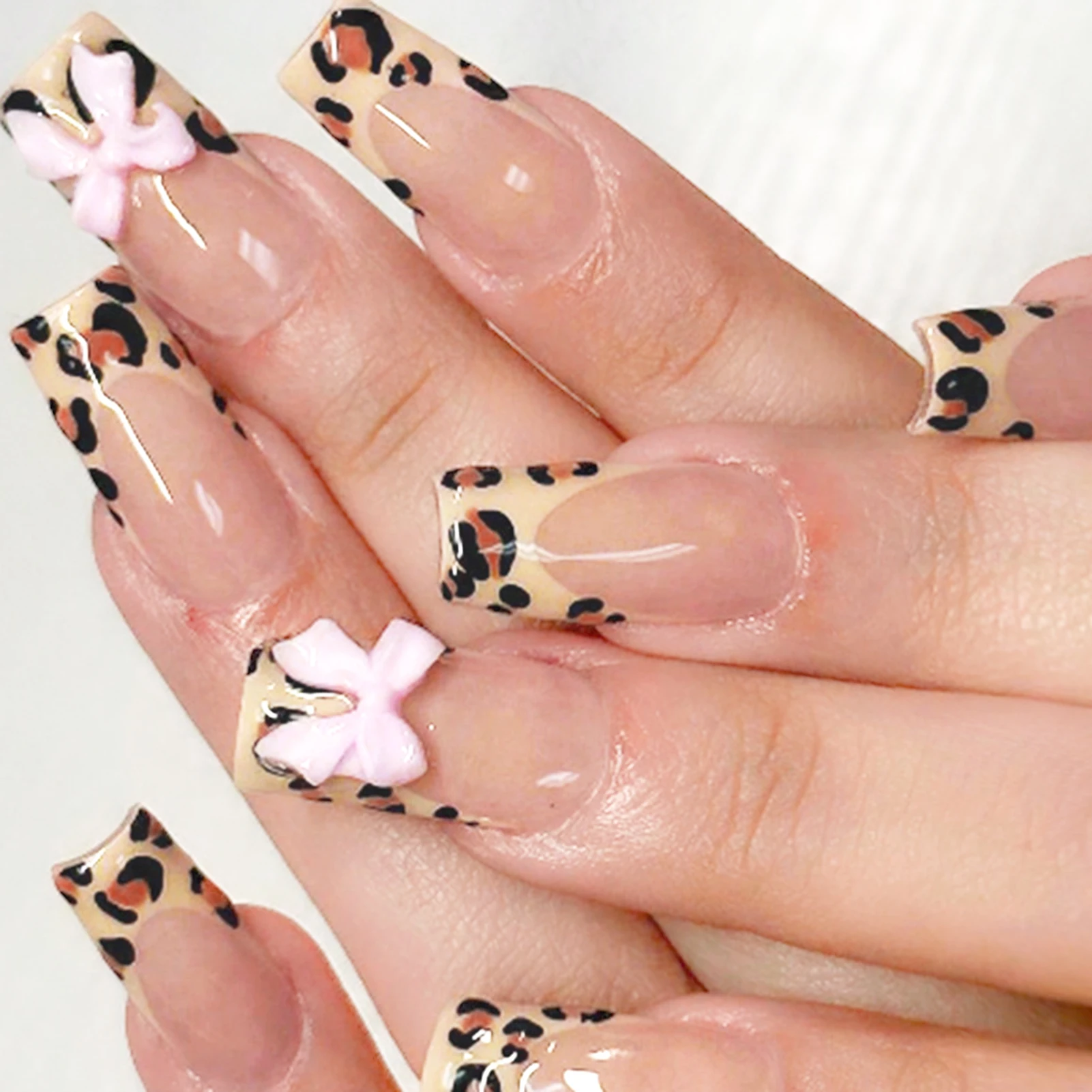 24Pcs French Leopard False Nails - Long Coffin Fake Nails 3D Bowknot Decor - Acrylic Full Cover Press on Nails for Women
24Pcs French Leopard False Nails - Long Coffin Fake Nails 3D Bowknot Decor - Acrylic Full Cover Press on Nails for Women