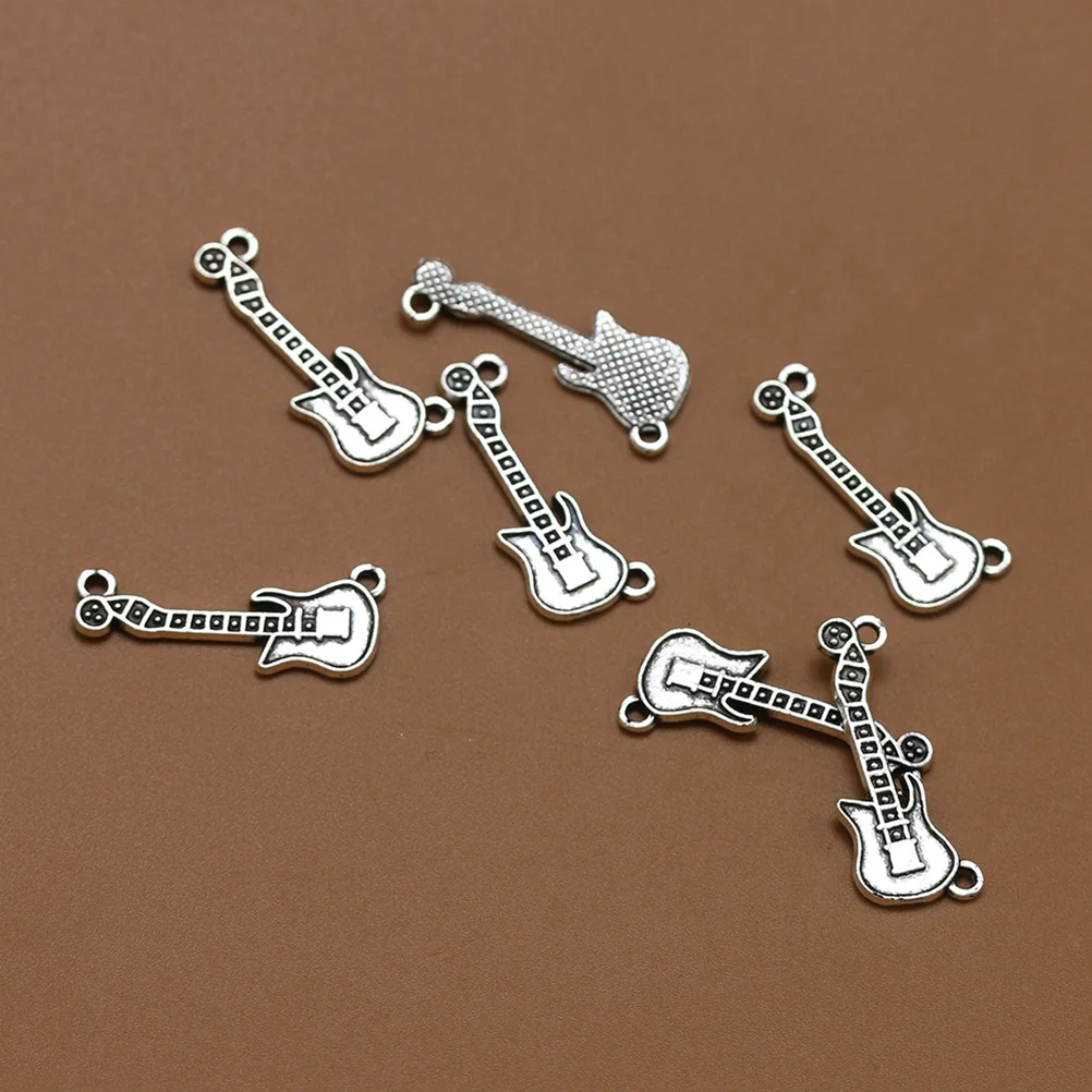 20Pcs Guitar Pendant Charms Alloy Silver Fine Workmanship DIY Jewelry Making Necklace Bracelet Gifts Guitar Pendant
20Pcs Guitar Pendant Charms Alloy Silver Fine Workmanship DIY Jewelry Making Necklace Bracelet Gifts Guitar Pendant