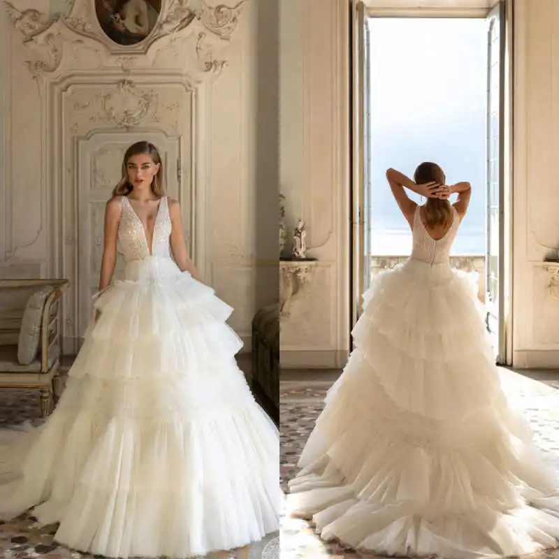 Charming Sequin Tiered Ruffled Skirt Train Wedding Dress Spaghetti Strap Deep V-Neck Bridal Gown Vestido De Novia Customized
Charming Sequin Tiered Ruffled Skirt Train Wedding Dress Spaghetti Strap Deep V-Neck Bridal Gown Vestido De Novia Customized
